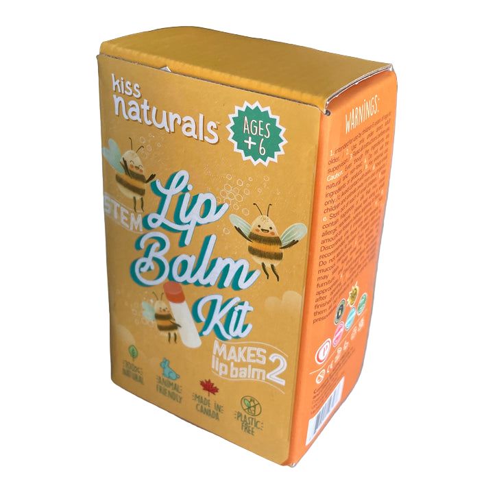 Kiss Naturals lip balm kit packaging on a white surface