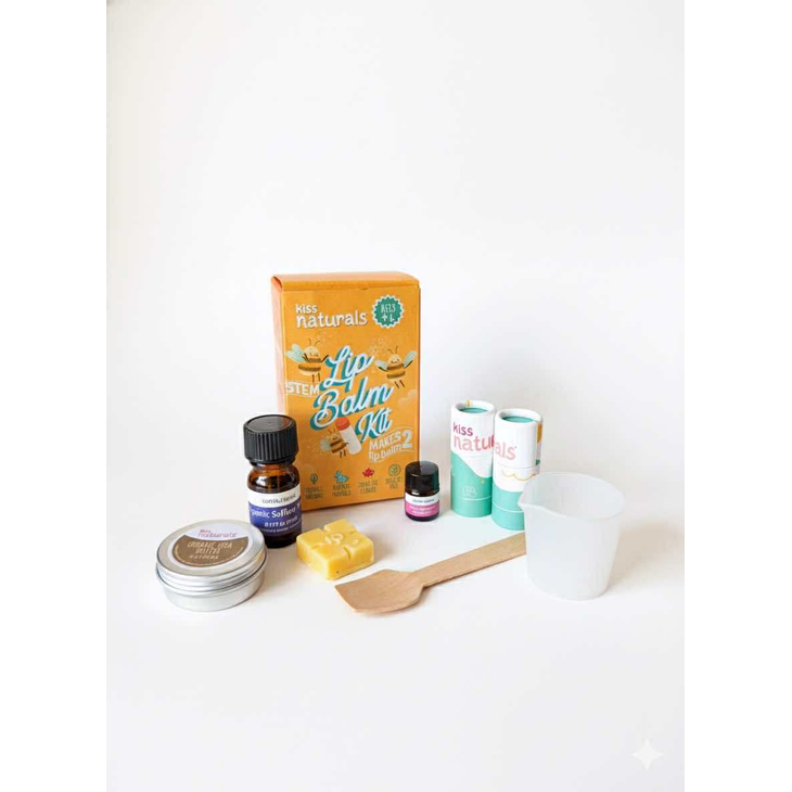 Lip balm kit with various components on a white background